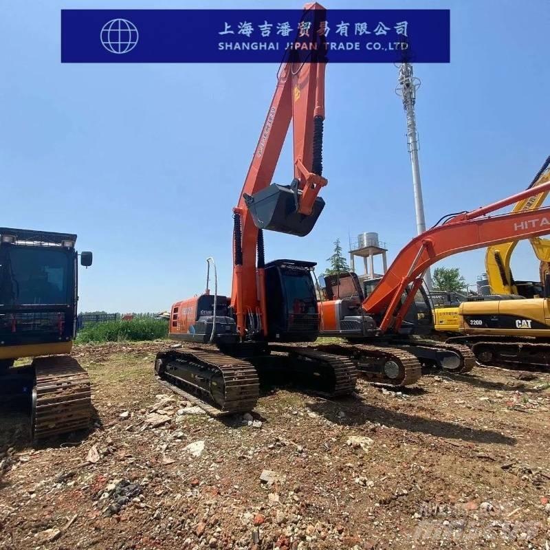 Hitachi ZX 210 Bandgrävare