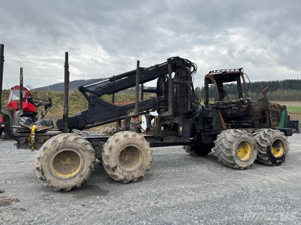 John Deere 1110 E Skotare
