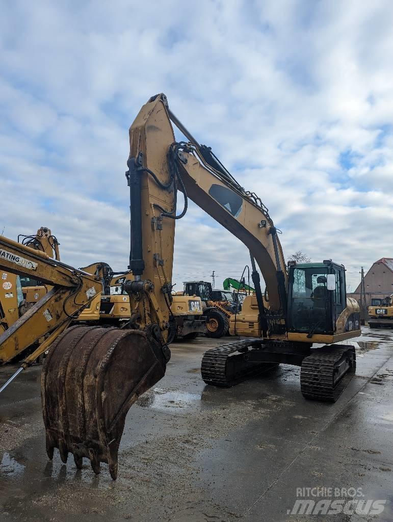 CAT 323 D Bandgrävare