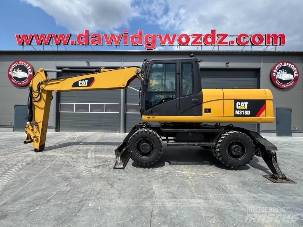CAT M 318 D Hjulgrävare