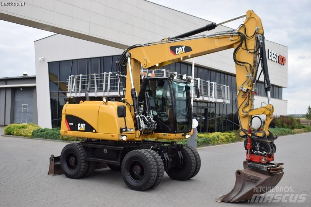 CAT M 313 D Hjulgrävare