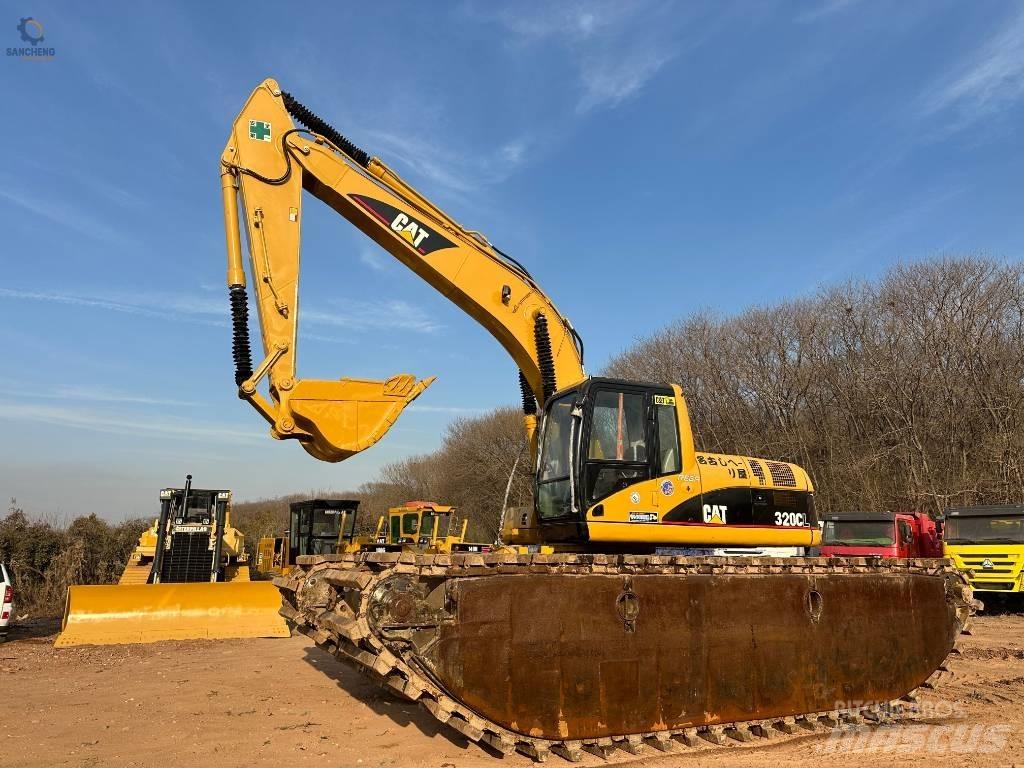 CAT 320 C L Amfibiska grävmaskiner