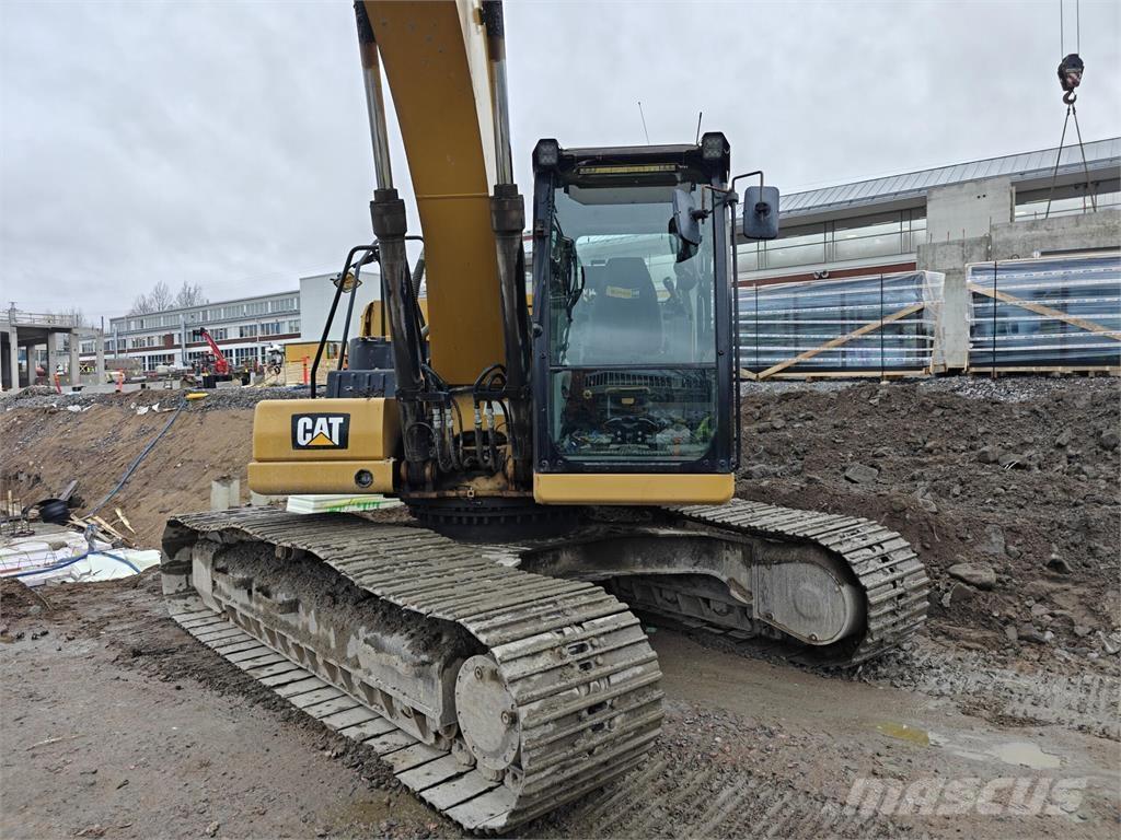 CAT 323 Bandgrävare