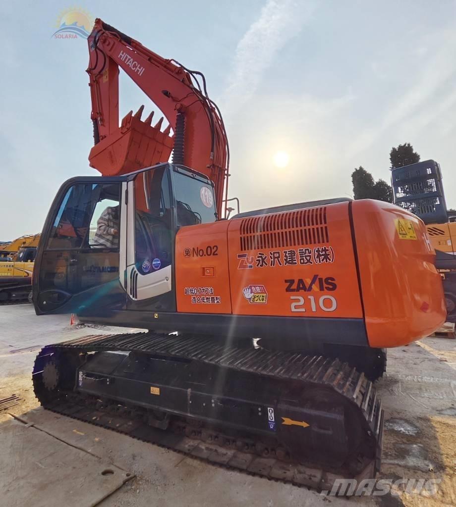 Hitachi ZX 210 Bandgrävare