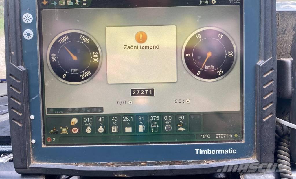 John Deere 1110 E Skotare