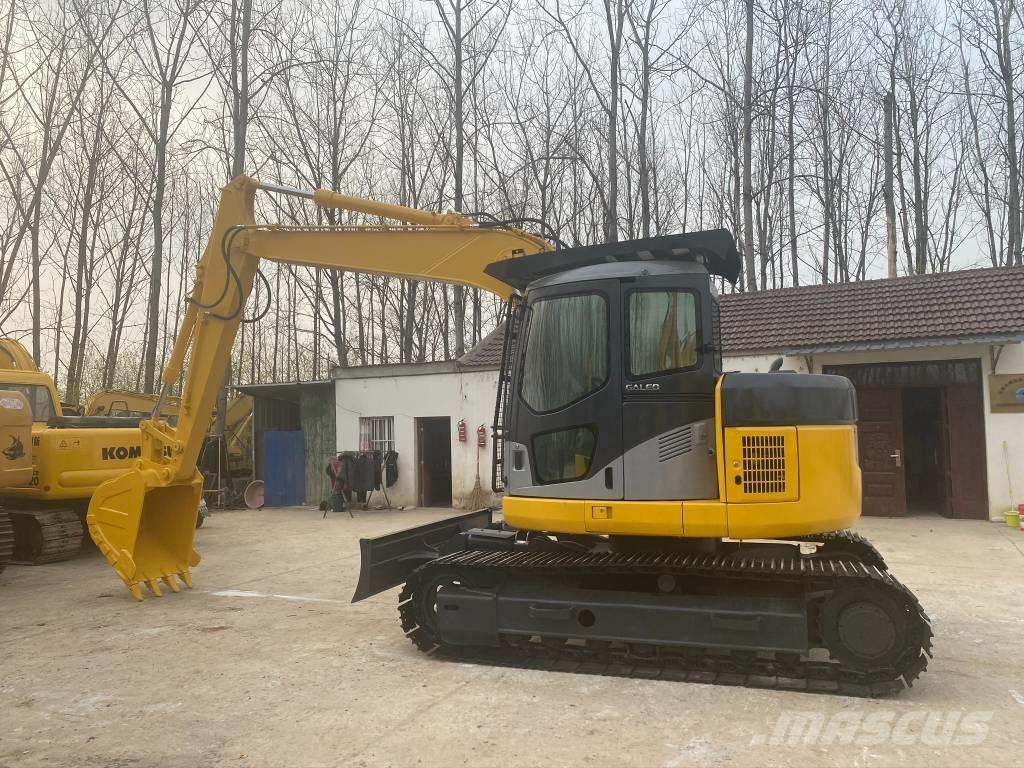 Komatsu PC128US Bandgrävare