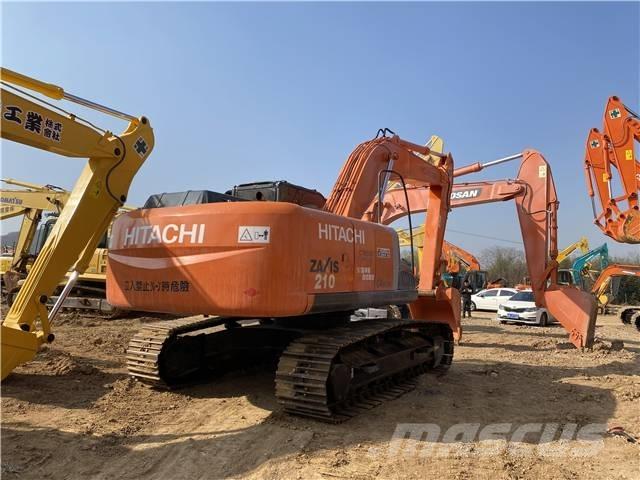 Hitachi ZX210 Bandgrävare