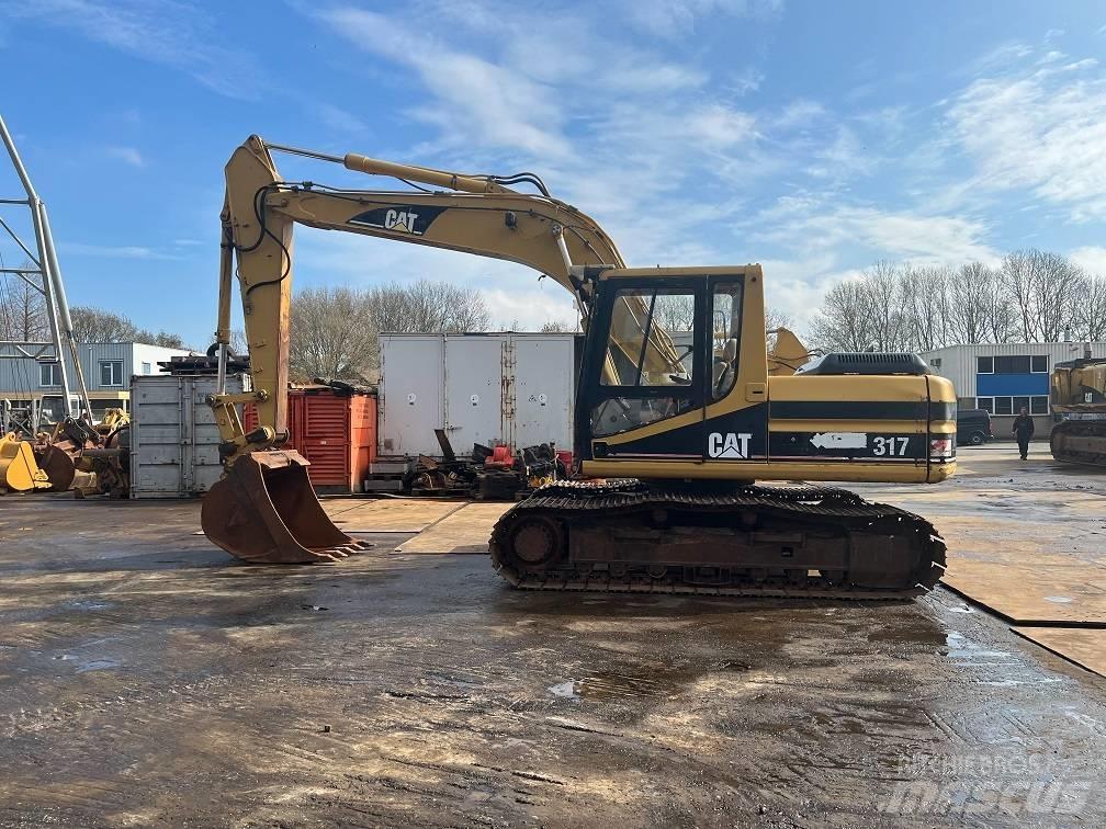 CAT 317 Bandgrävare