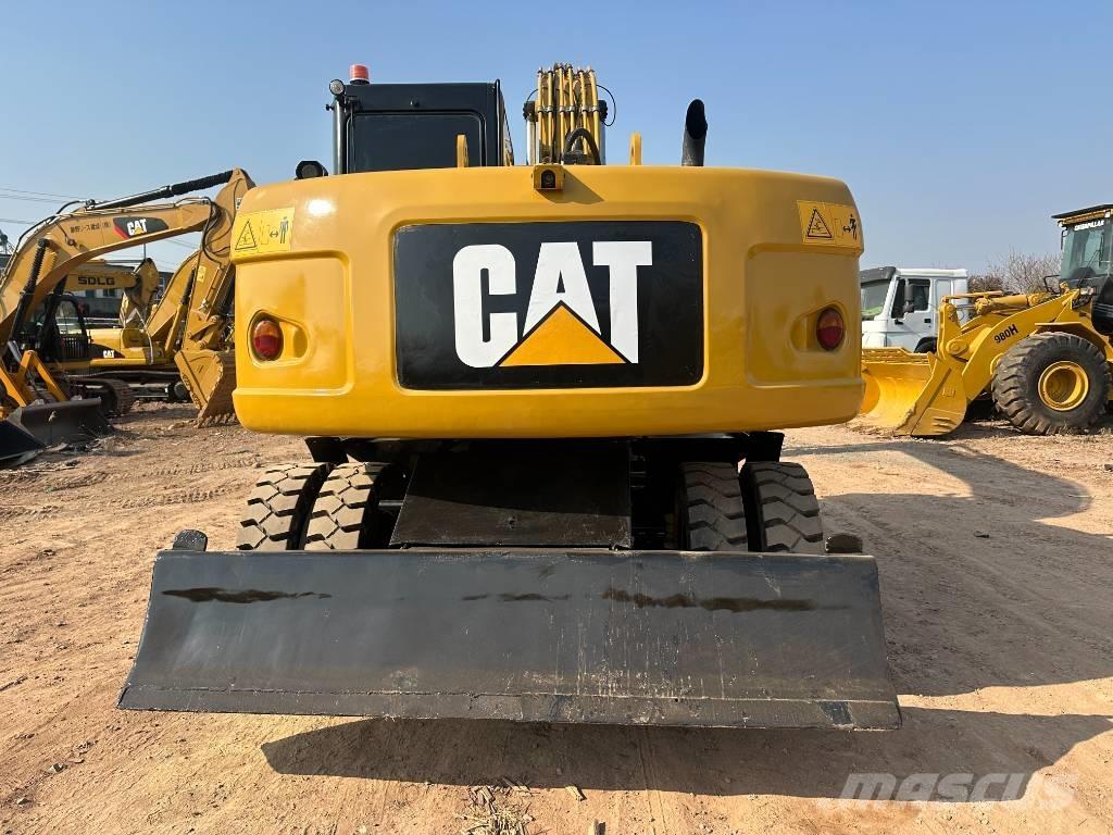 CAT M 320D Hjulgrävare