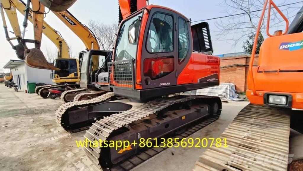 Doosan DX 225 Bandgrävare
