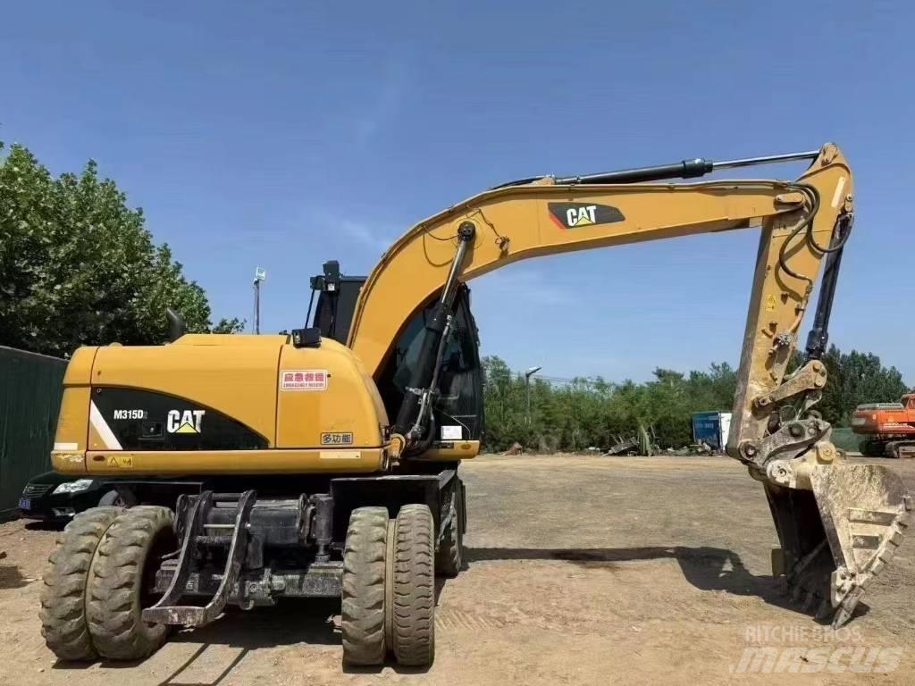 CAT M 315 D Hjulgrävare