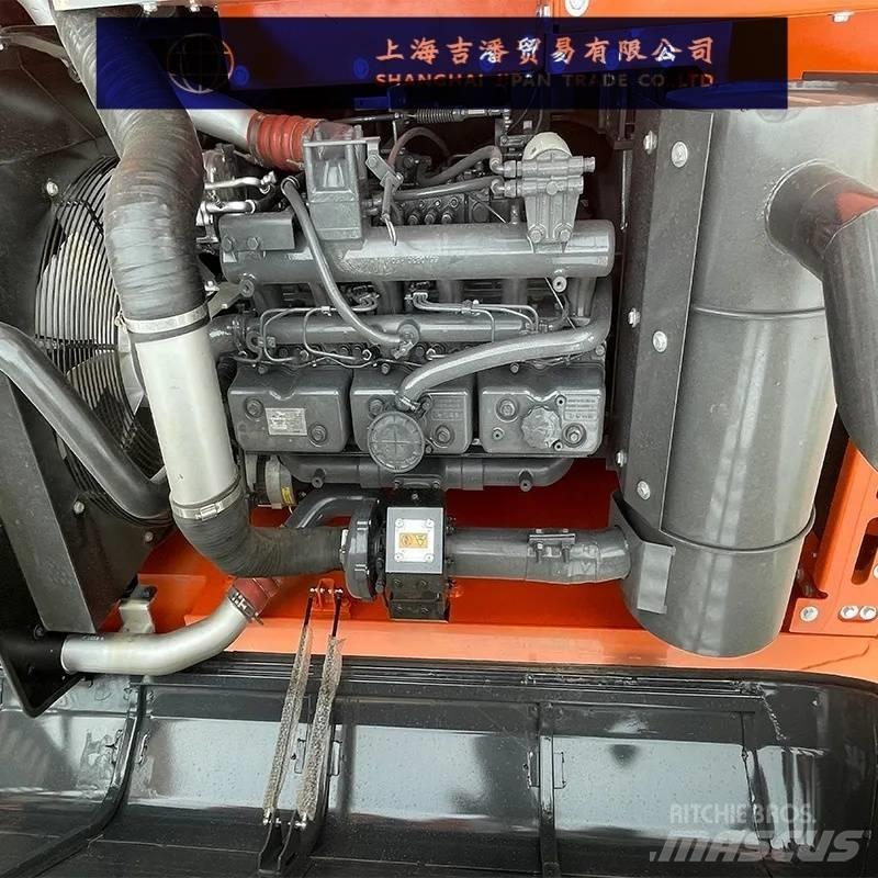 Doosan DX 225 Bandgrävare