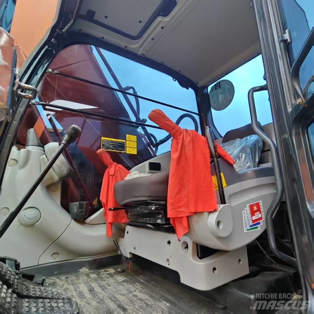Hitachi ZX 210 Bandgrävare