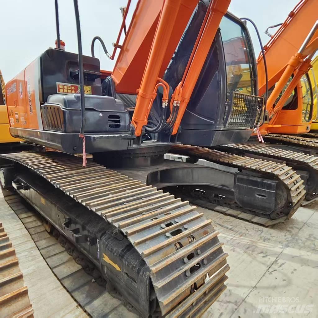 Hitachi ZX 210 Bandgrävare