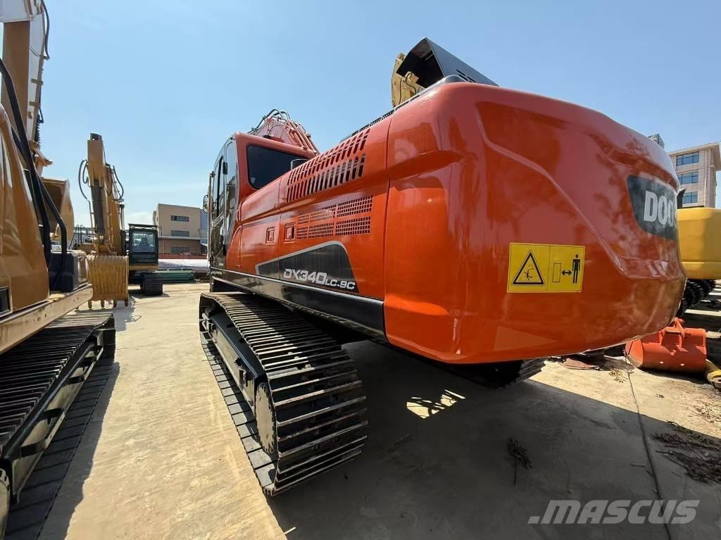 Doosan DX 340 Bandgrävare