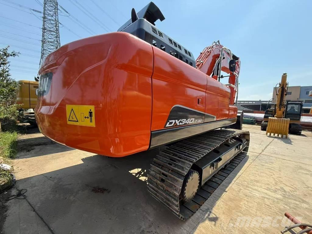 Doosan DX 340 Bandgrävare