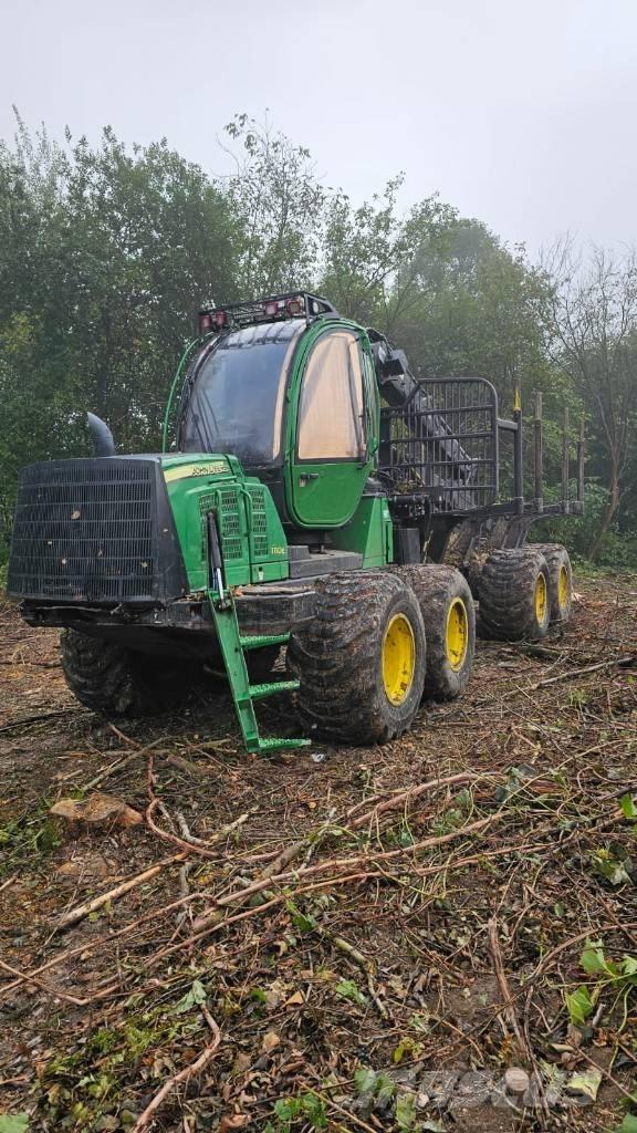 John Deere 1110 E Skotare