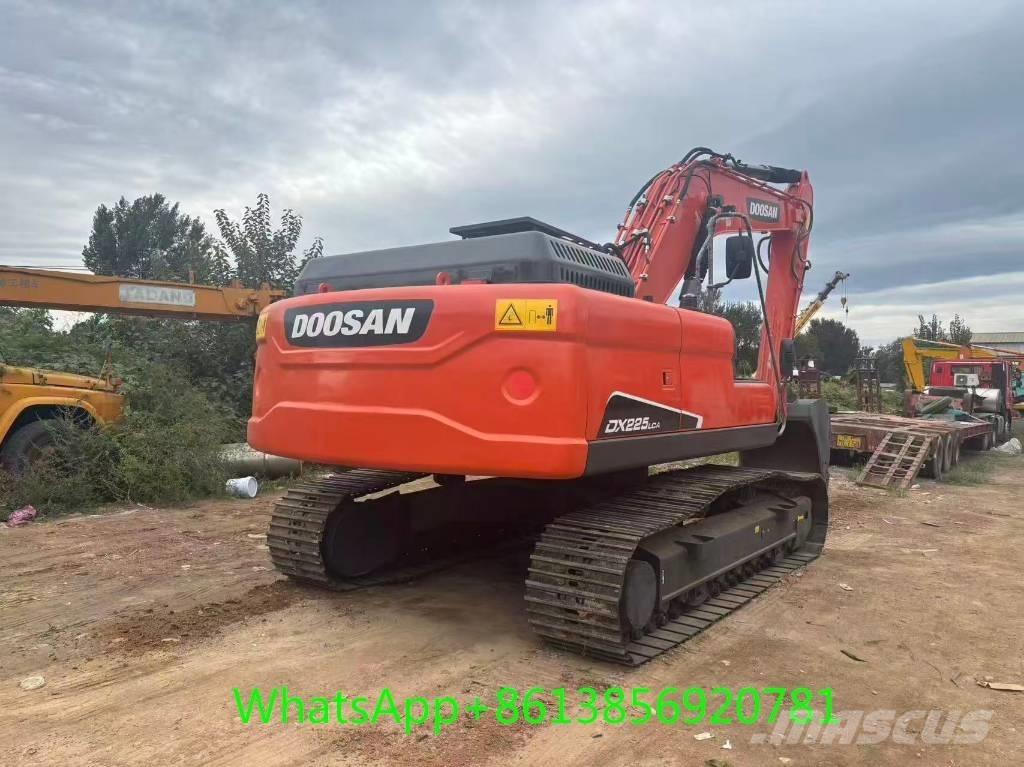 Doosan DX 225 Bandgrävare