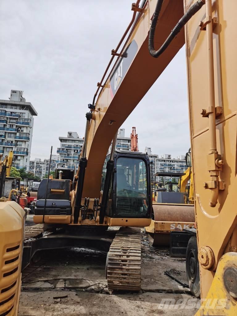 CAT 323D Bandgrävare