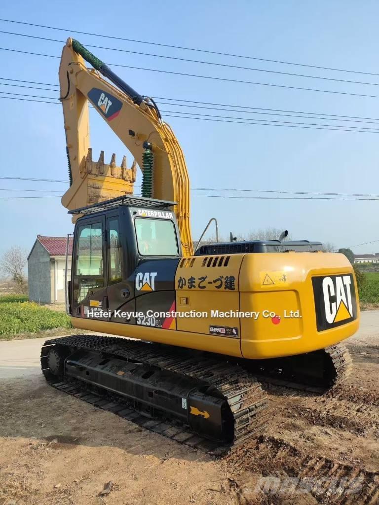 CAT 323 Bandgrävare