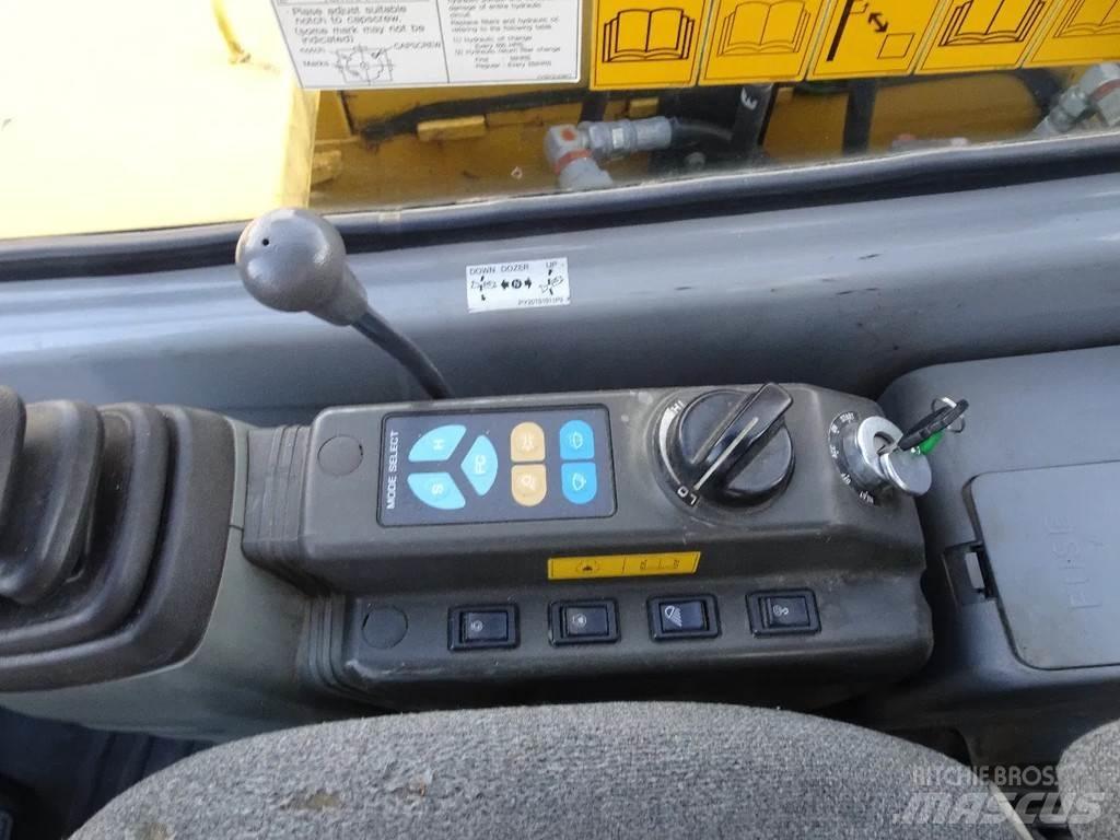 New Holland E80 Bandgrävare