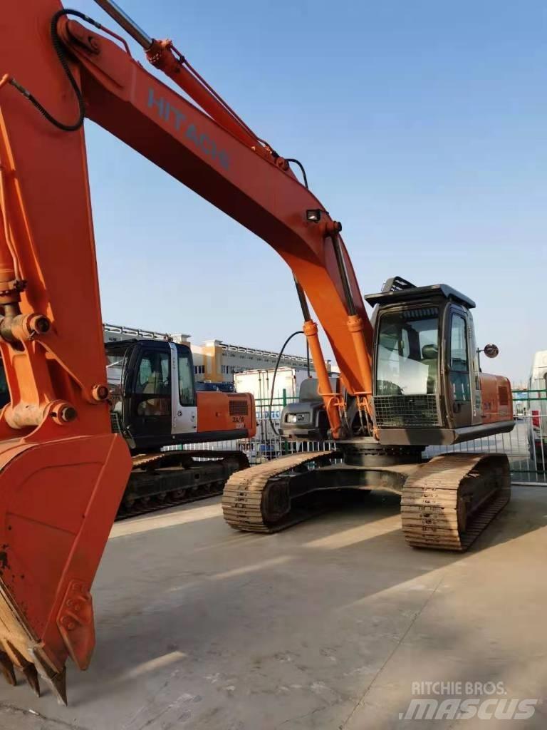 Hitachi ZX 210 Bandgrävare