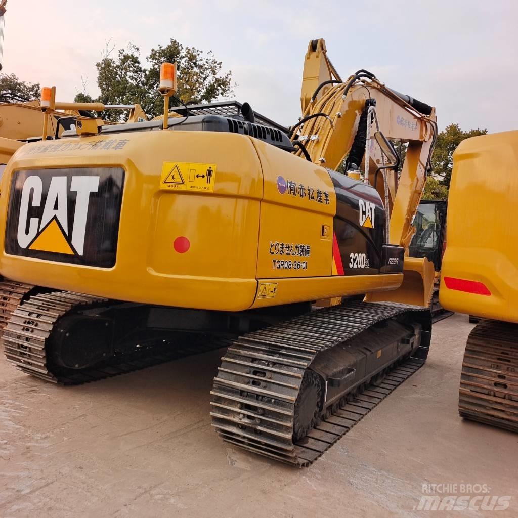 CAT 320DL Bandgrävare