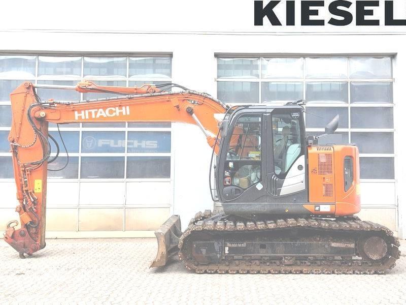 Hitachi ZX 135 US-6 Bandgrävare