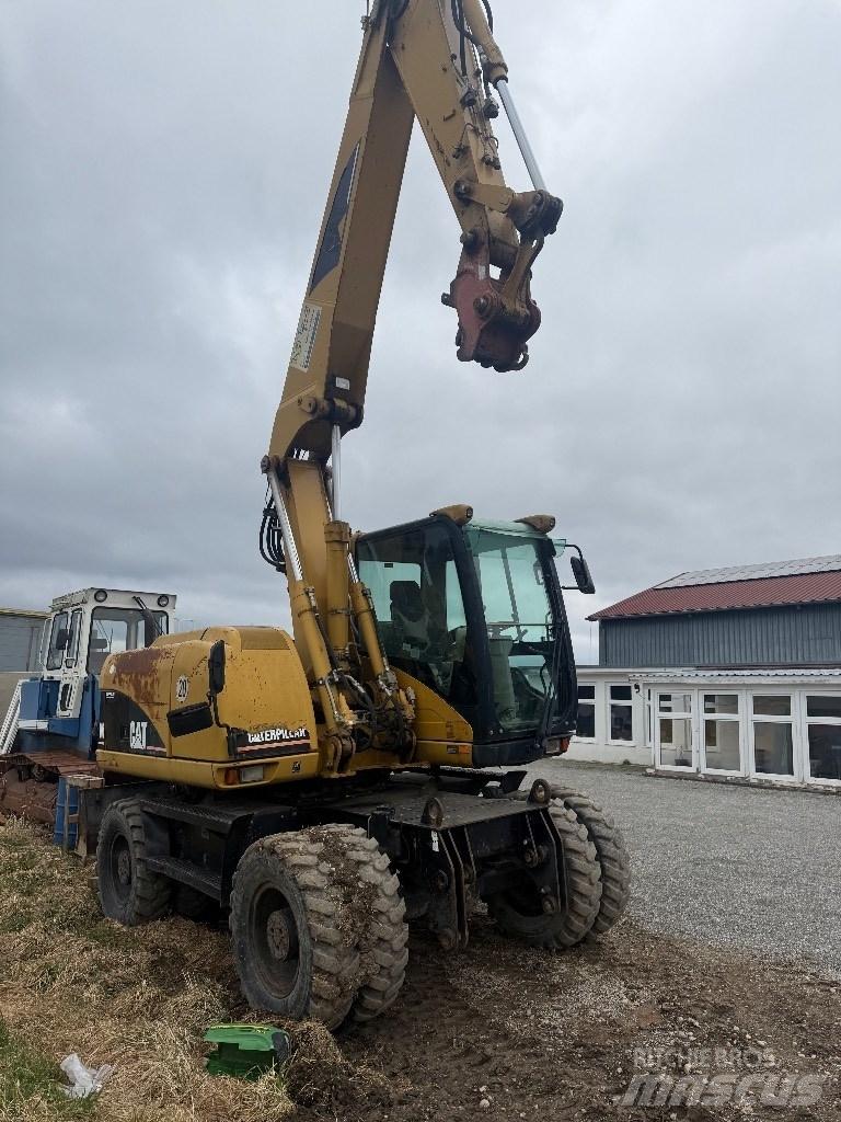 CAT M 313 C Hjulgrävare