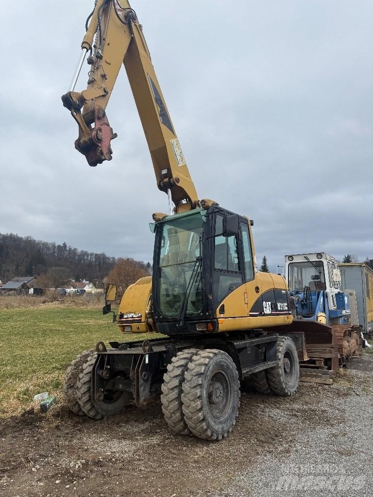 CAT M 313 C Hjulgrävare