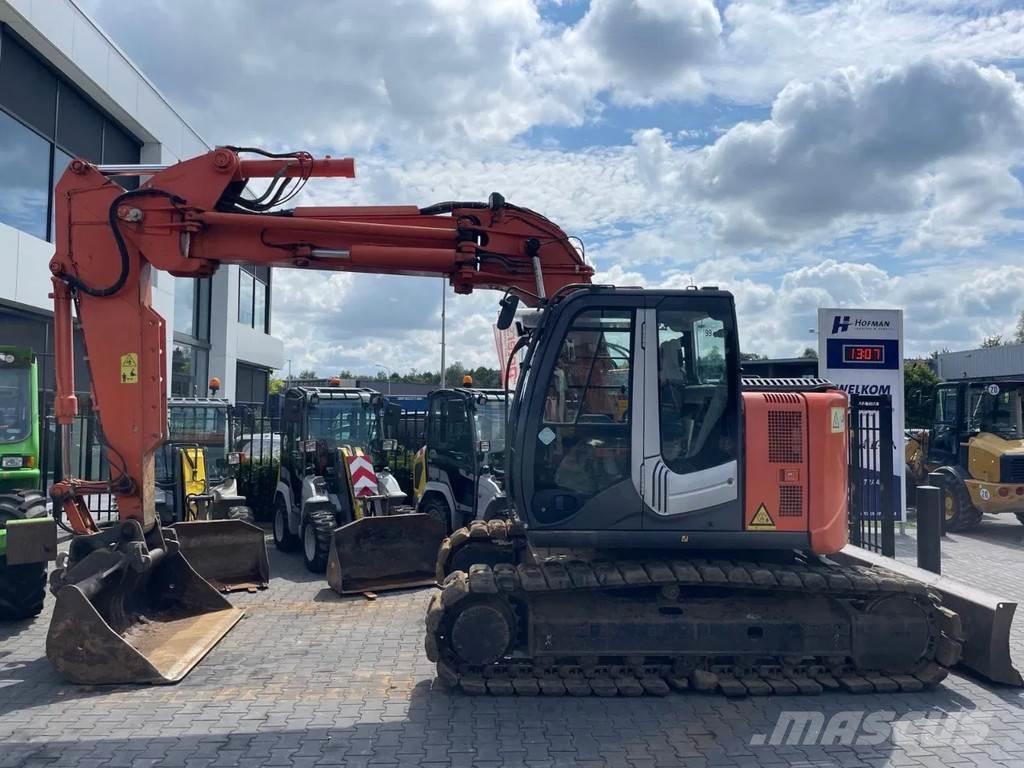 Hitachi ZX135US-3 Bandgrävare