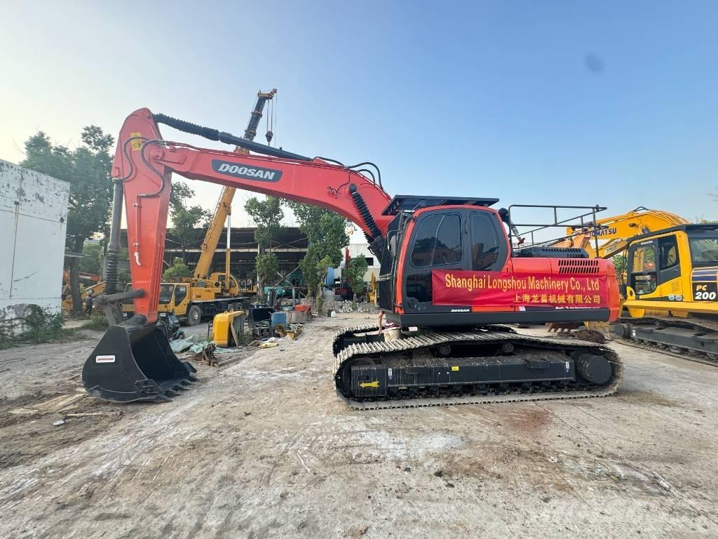 Doosan DX 225 LC Bandgrävare