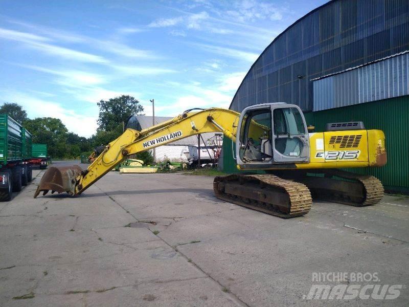 New Holland E 215 Bandgrävare