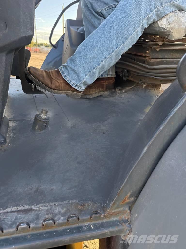 John Deere 310 L EP Grävlastare