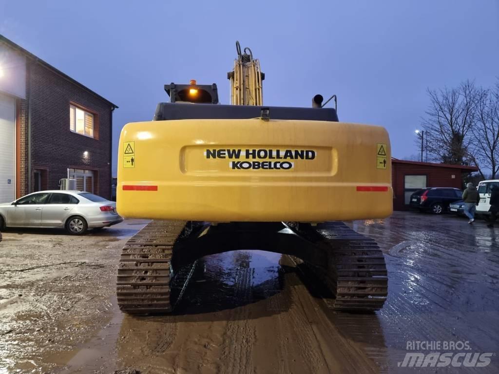 New Holland E 385 Bandgrävare