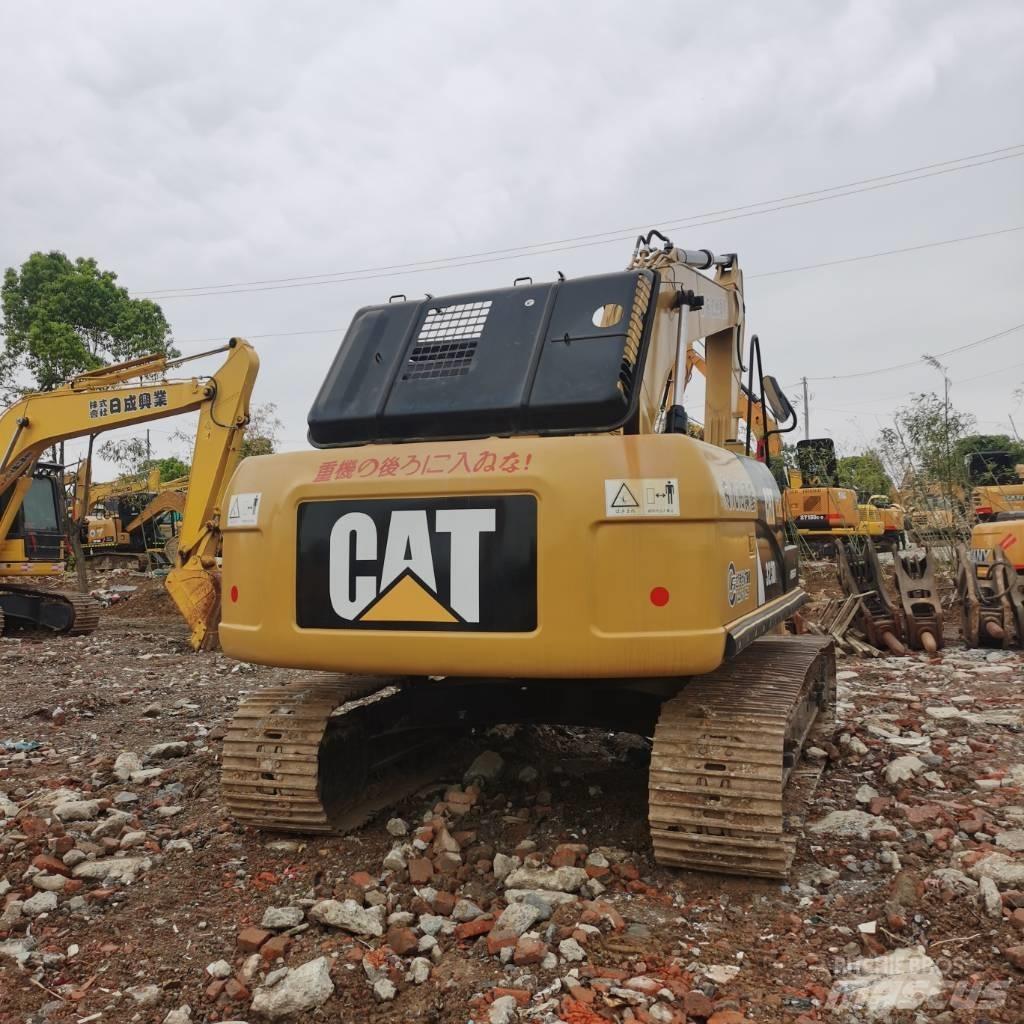 CAT 323DL Bandgrävare