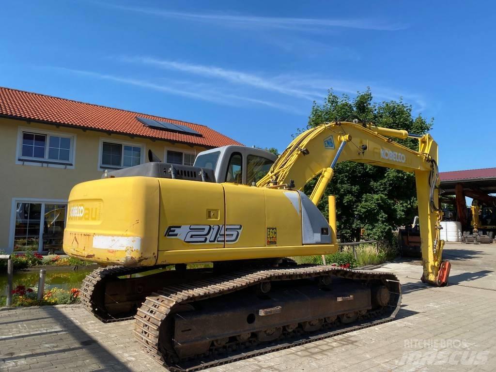 New Holland E 215 Bandgrävare