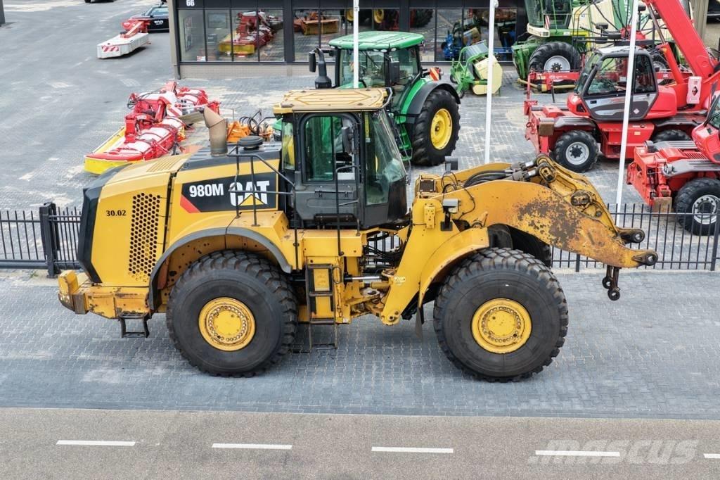 CAT 980M shovel + Bak Hjullastare