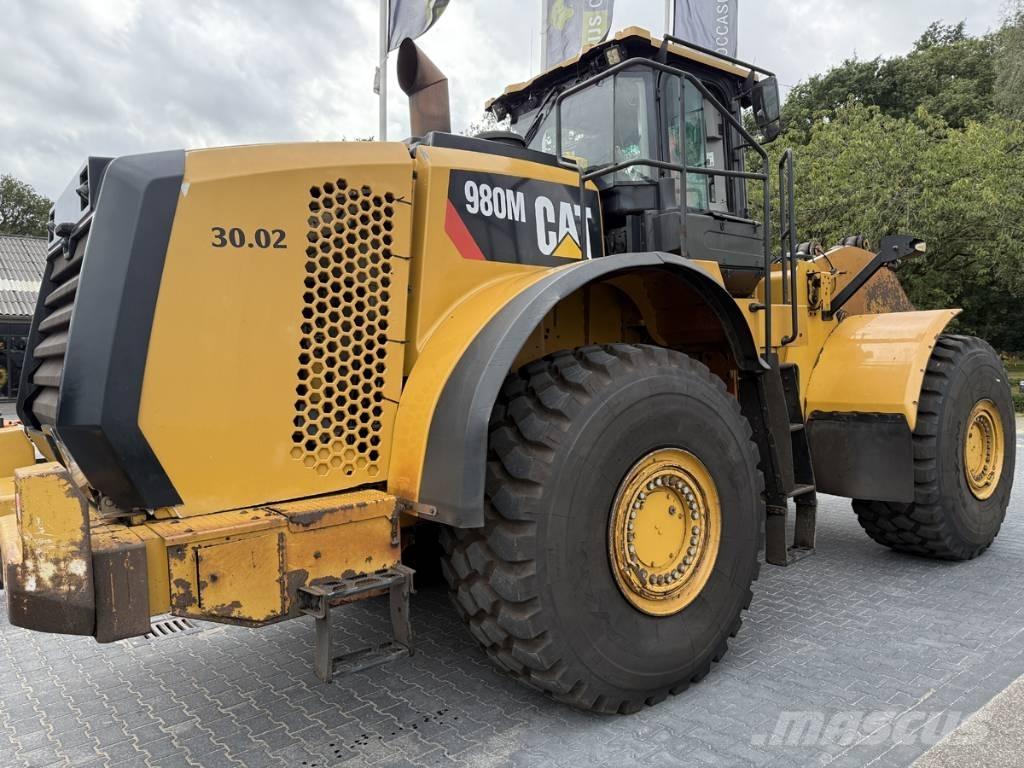 CAT 980M shovel + Bak Hjullastare