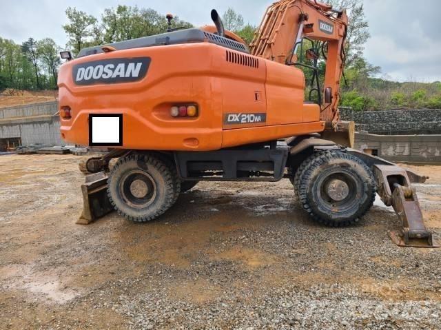 Doosan DX 210 W Hjulgrävare