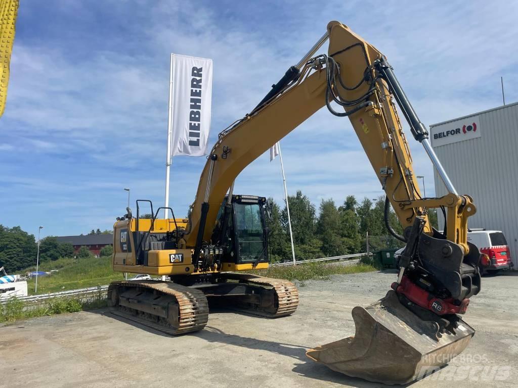 CAT 323NG Bandgrävare