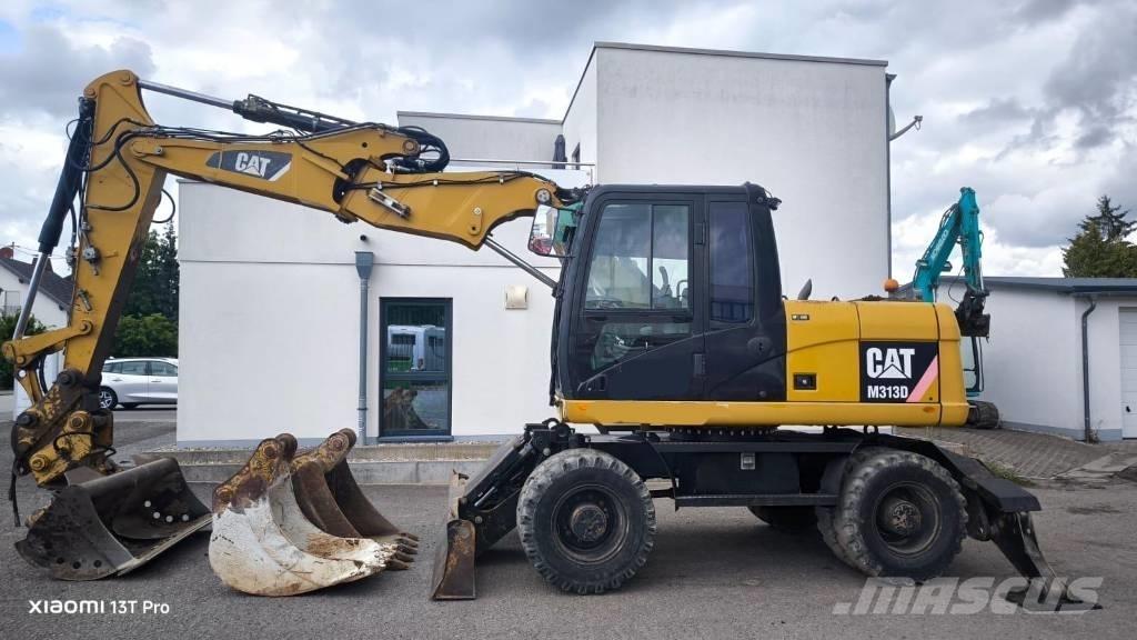 CAT M 313 D Hjulgrävare