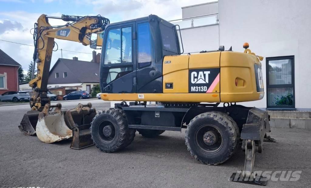 CAT M 313 D Hjulgrävare