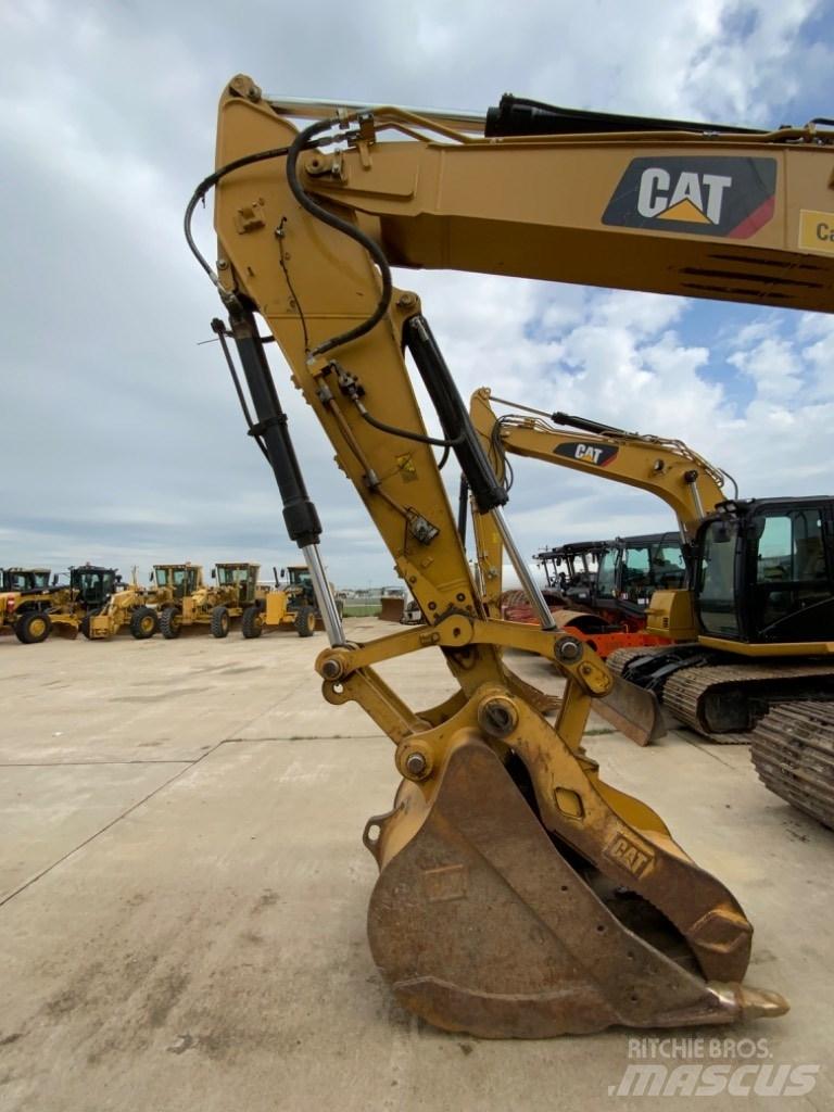 CAT 323 Bandgrävare