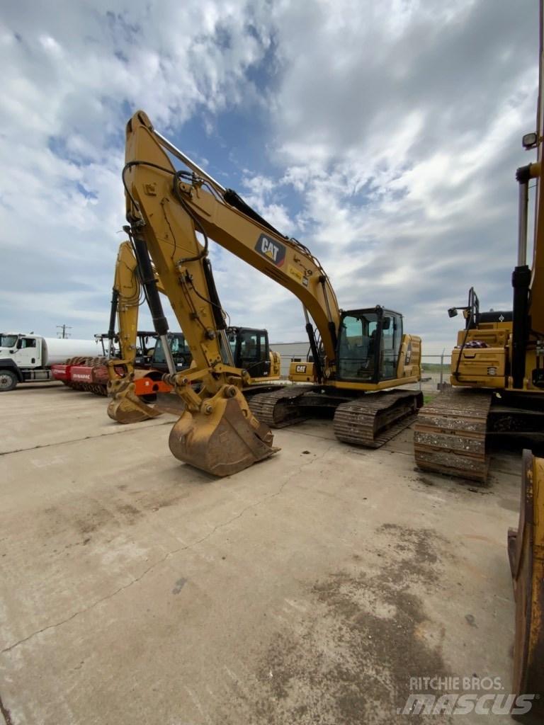 CAT 323 Bandgrävare