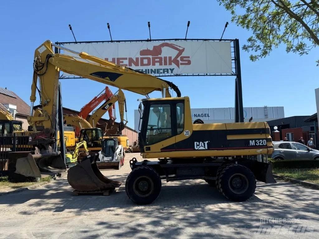 CAT M320 2001 Hjulgrävare