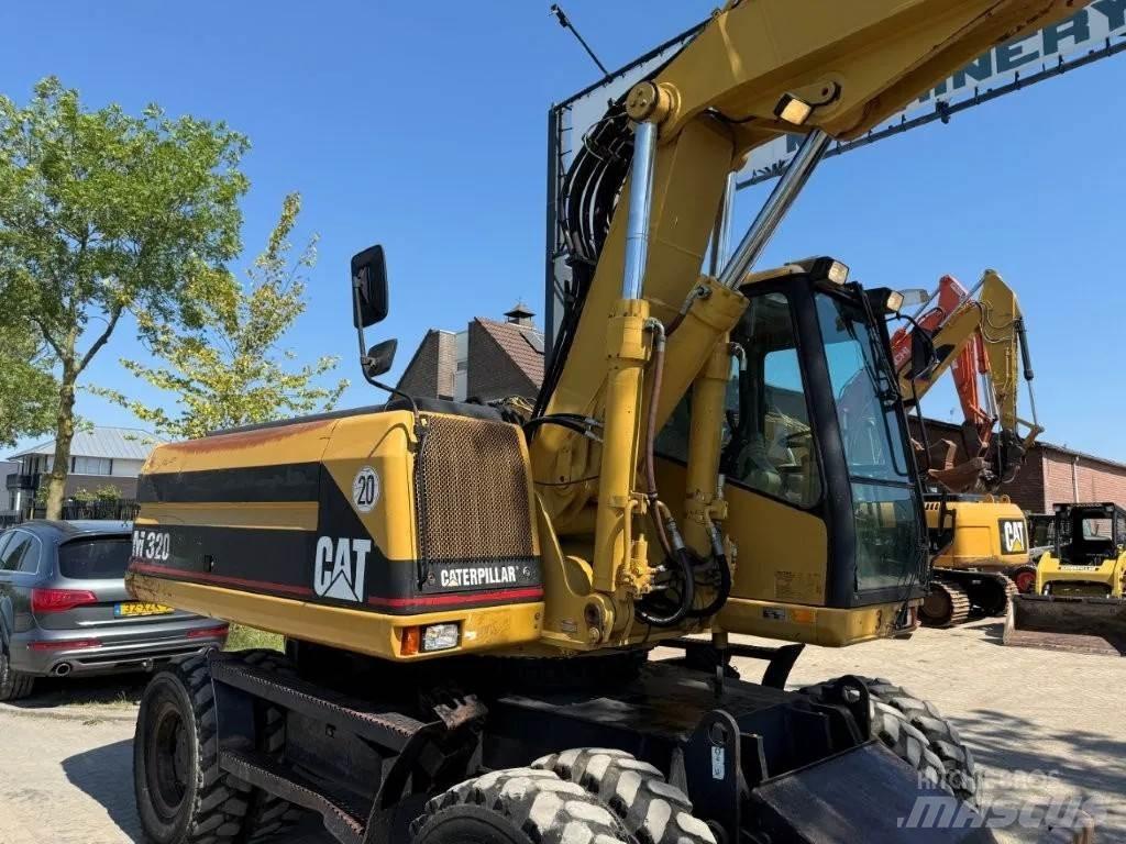 CAT M320 2001 Hjulgrävare