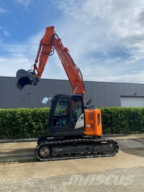 Hitachi ZX 135 US-6 Bandgrävare