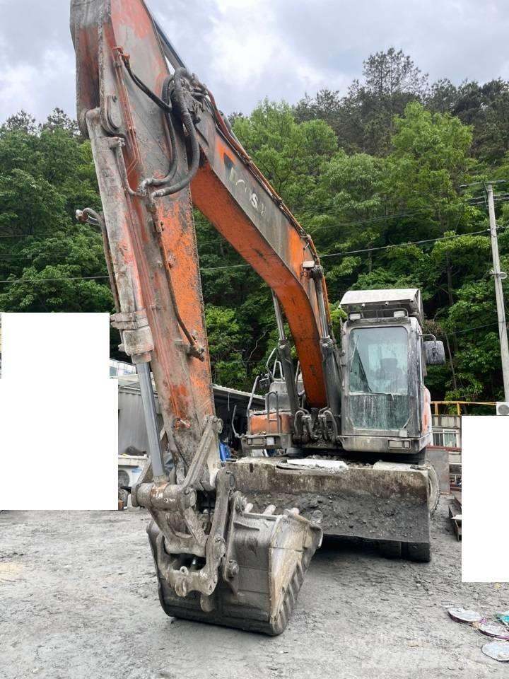 Doosan DX 210 W Hjulgrävare