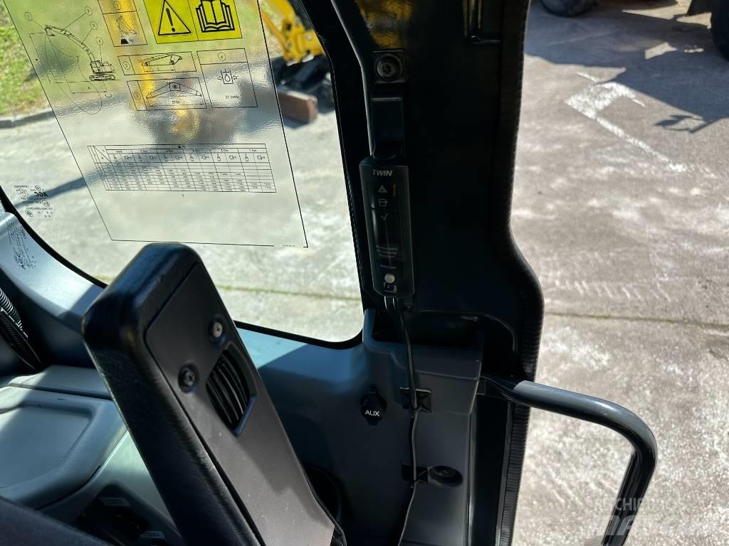 Komatsu PC210LCi-11 Bandgrävare